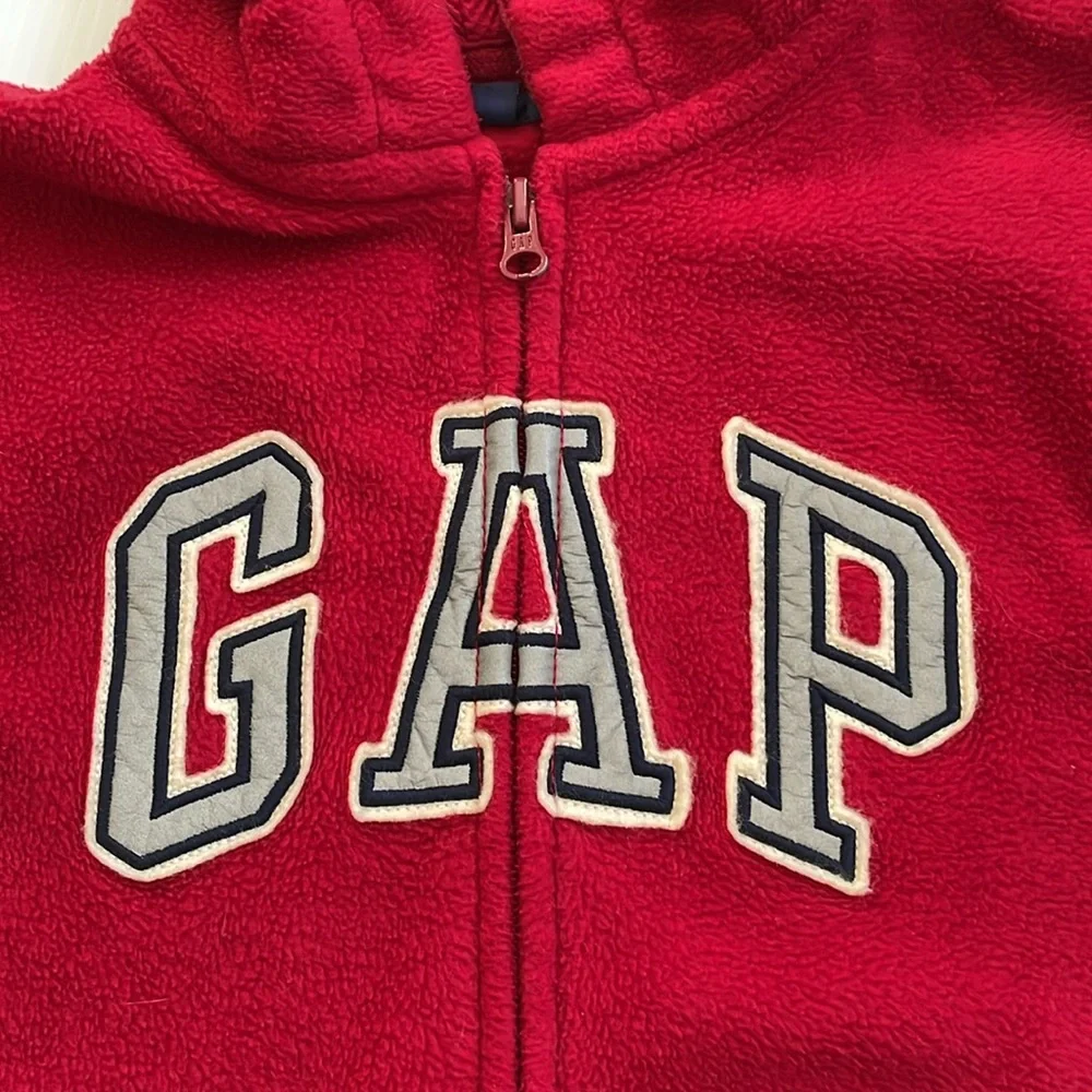 GapKids red hooded, full zip sweatshirt with gray, blue & white GAP.  Size small